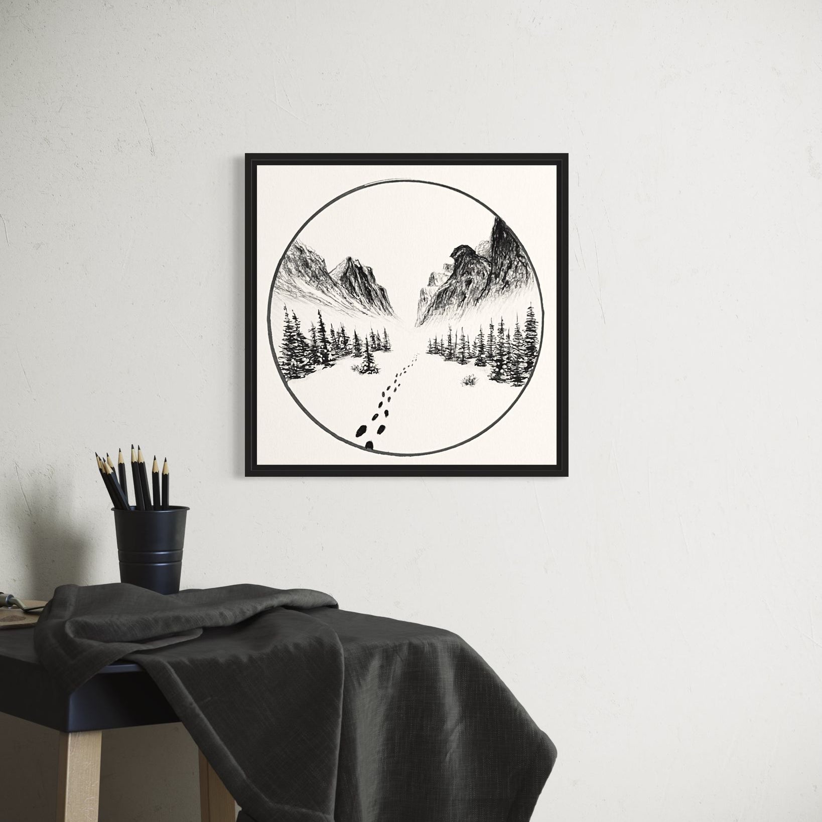 Illustration of a mountain landscape with trees and footprints in the snow, framed by a circle.