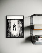 Black and white ink illustration in a frame of a diver ascending from underwater.