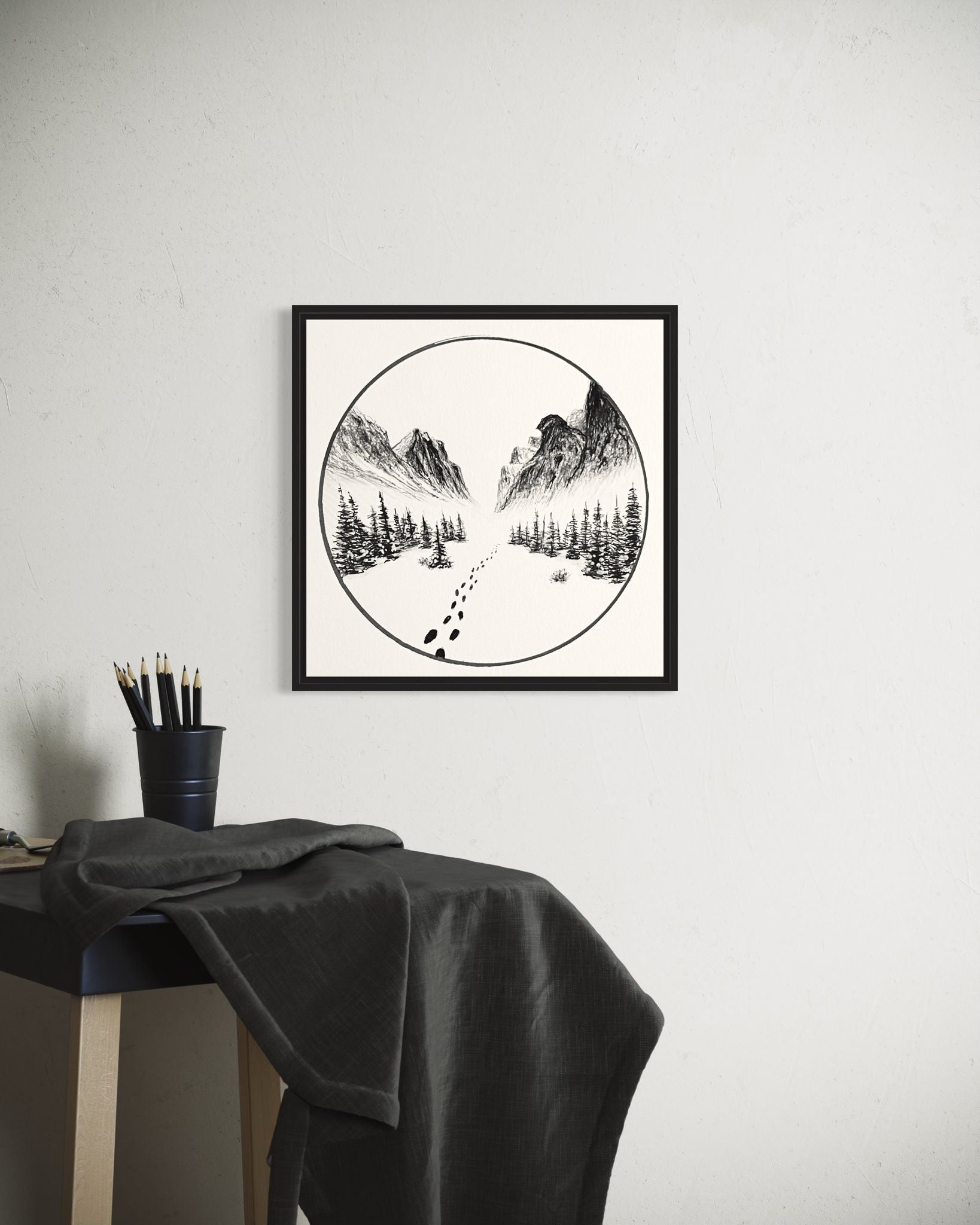 Illustration of a mountain landscape with trees and footprints in the snow, framed by a circle.